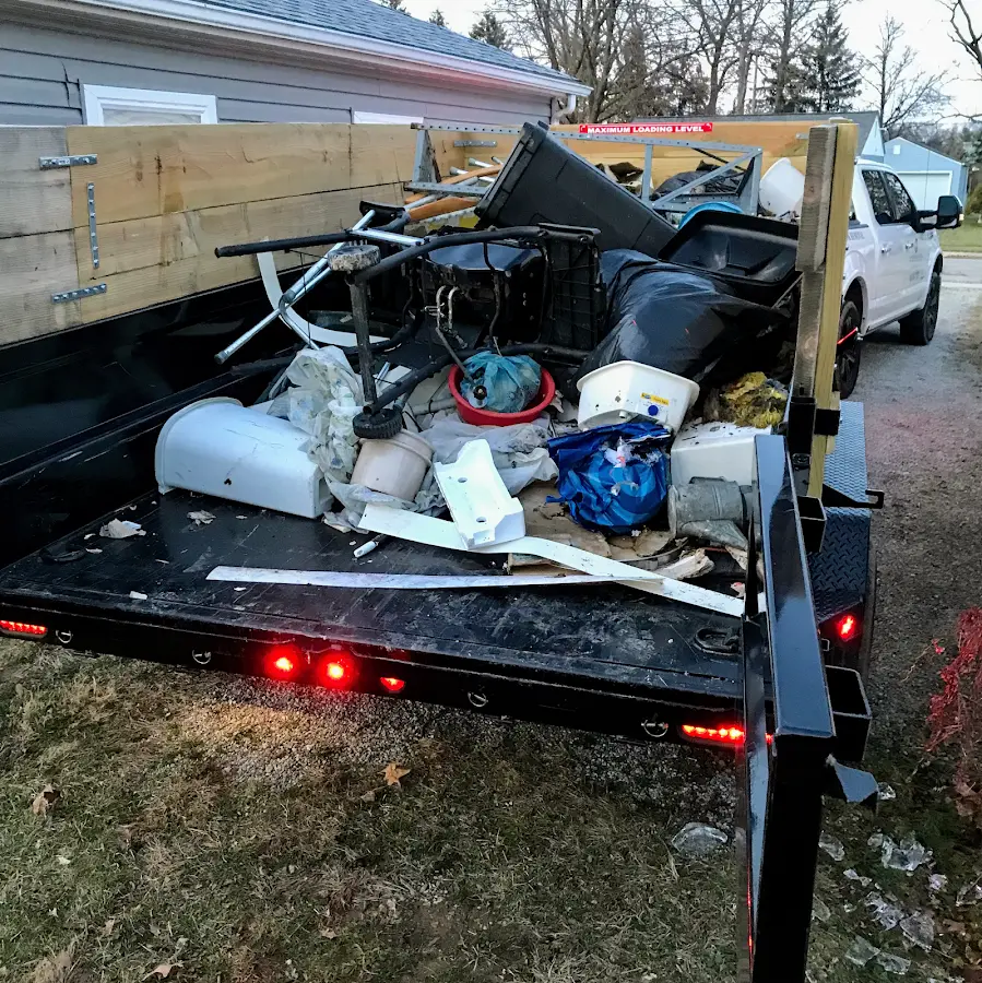 Roll-off dumpster delivered to a residential driveway in Loves Park