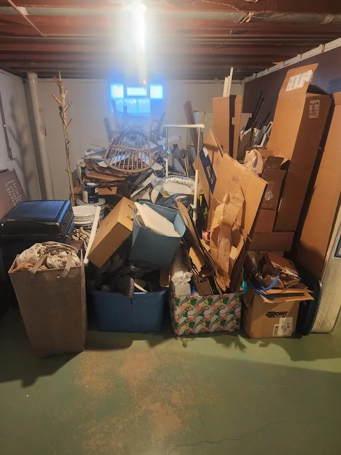 Roll-off dumpster container at job site for 20 Yard Dumpster Rental in Loves Park